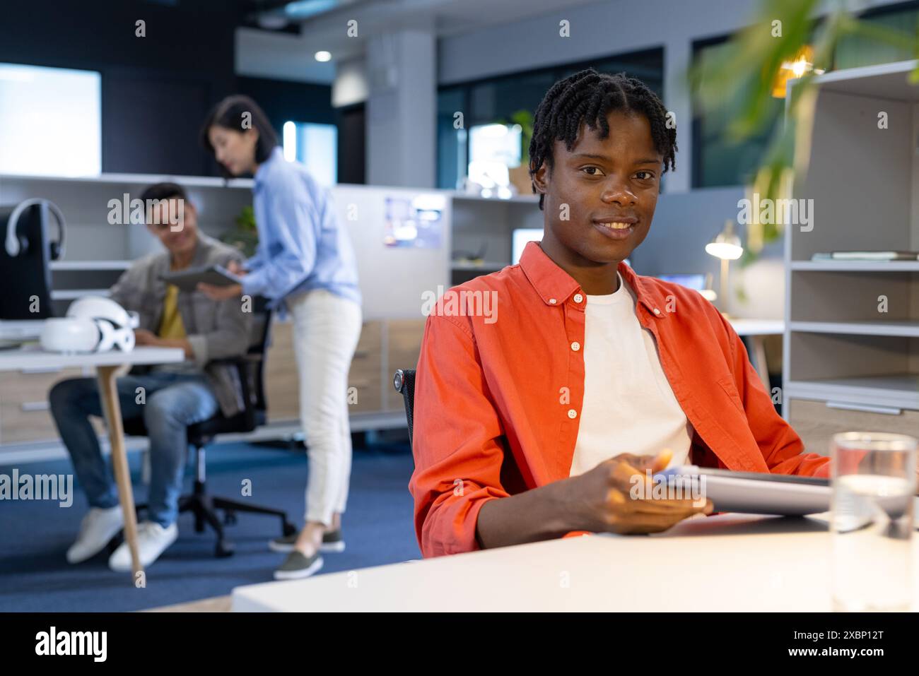 Diverse colleagues collaborating in modern office for business start-up ...