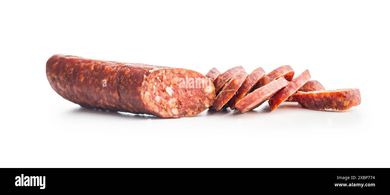 Sliced smoked Sausages salami On a White Background Stock Photo