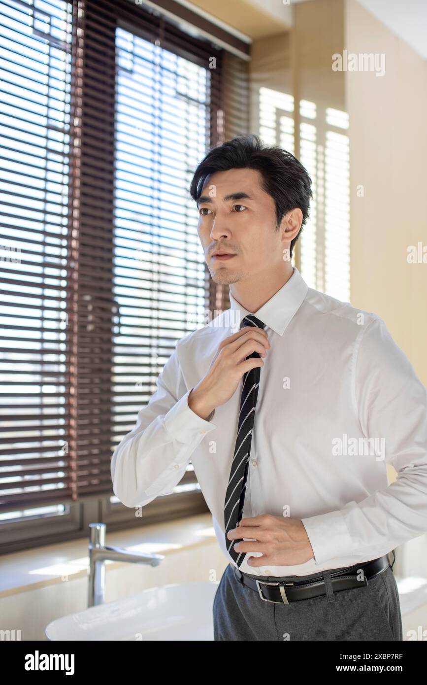 Mature Businessman Wearing A Shirt And Tie Stock Photo - Alamy