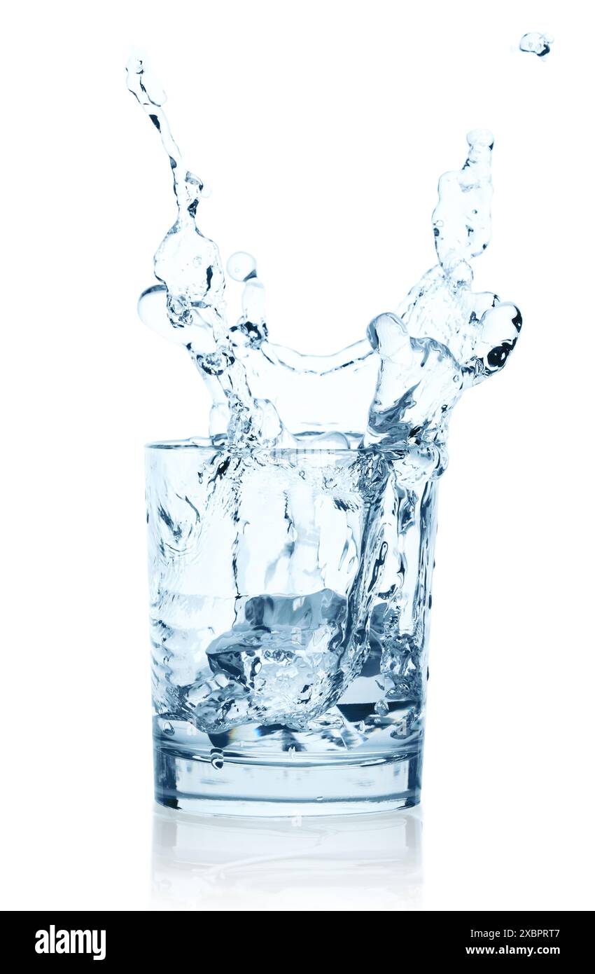Falling Ice Cubes into the Glass of Water with splash, isolated on a ...