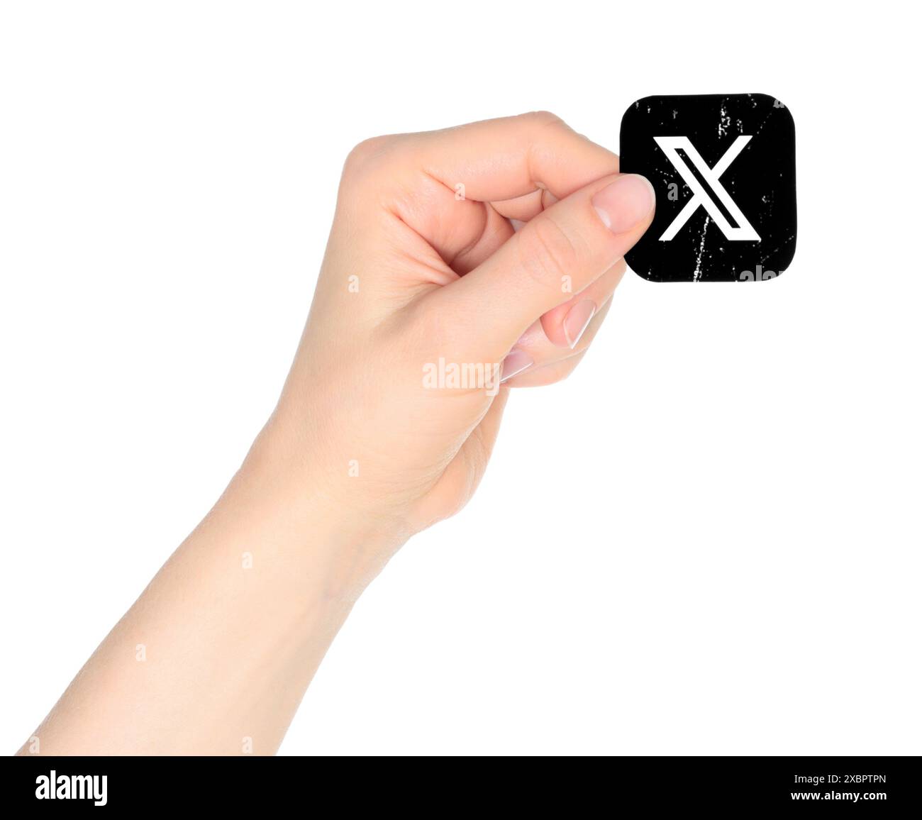 Hand holds X - Twitter icon on a white background. Popular social media ...