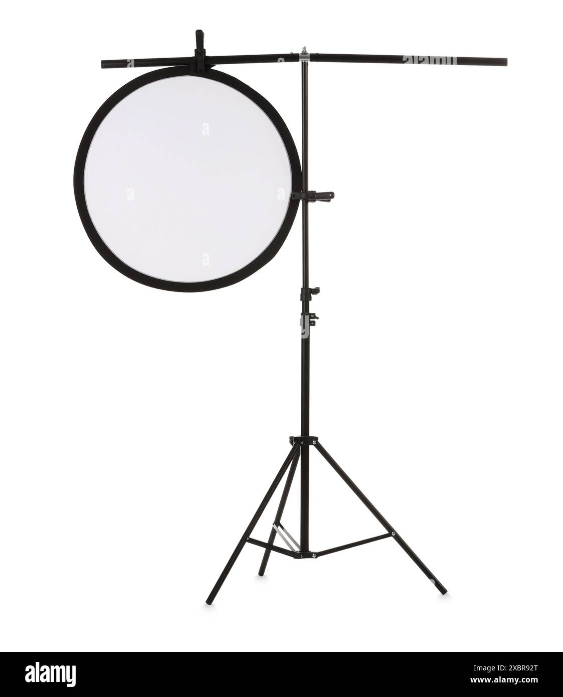 Stand with reflector isolated on white. Photo studio equipment Stock