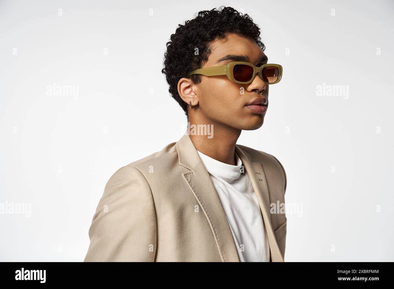 Stylish young man exudes hi-res stock photography and images - Alamy