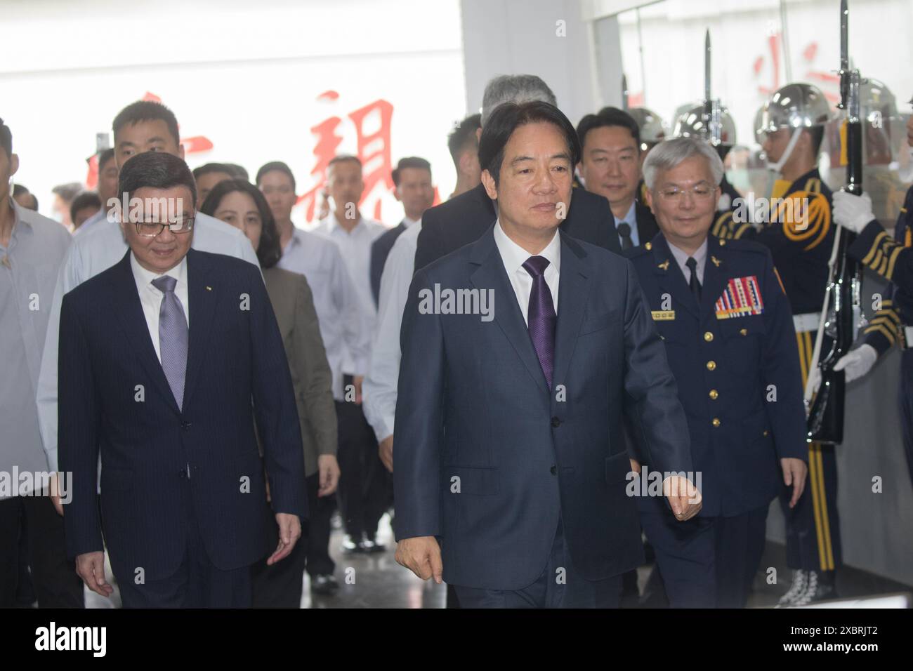 Taiwan President Lai Ching-te and Premier Minister Cho Jung-ta listen brief police uncover fraud cases during i a Police Day in Taiwan, June 13,2024. Stock Photo