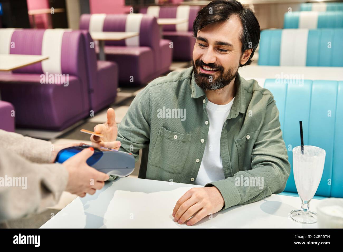 Man offers drink girl hi-res stock photography and images - Alamy