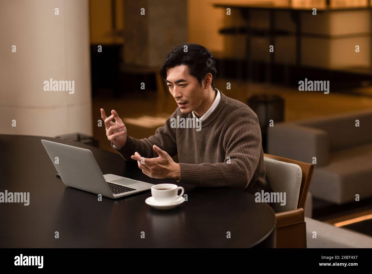 Male Teacher Remote Teaching Students Stock Photo