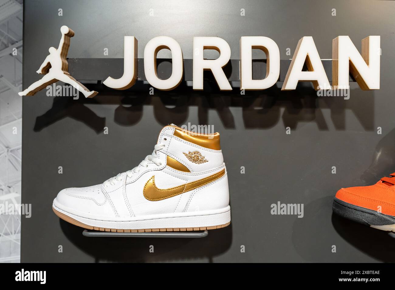 Nike Air Jordan logo and basketball shoes display in the interior of a ...