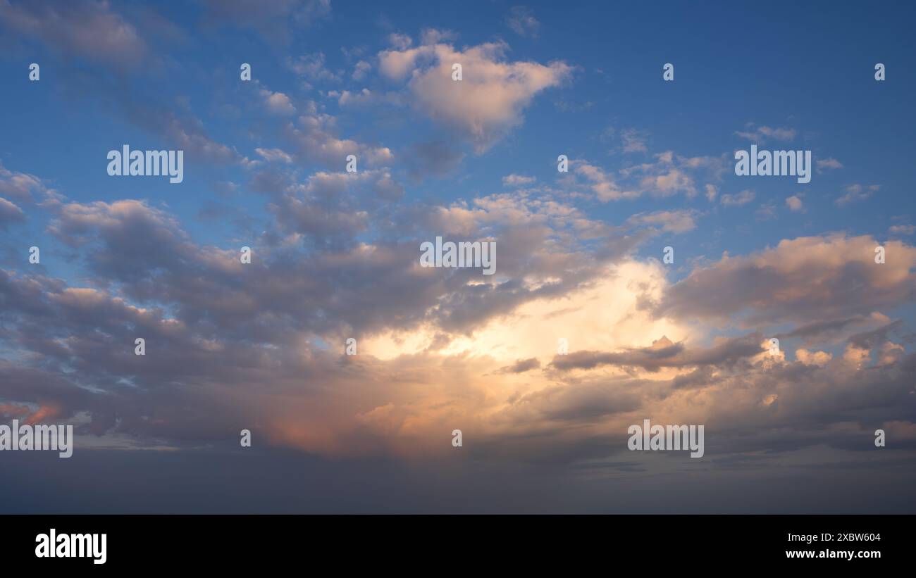 Low angle view to evening sky with dramatic clouds Stock Photo