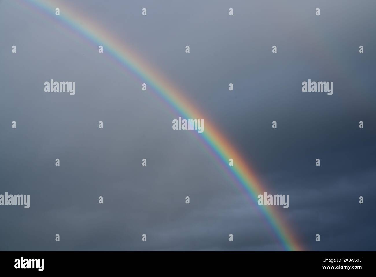 Low angle view to sky with rainbow Stock Photo