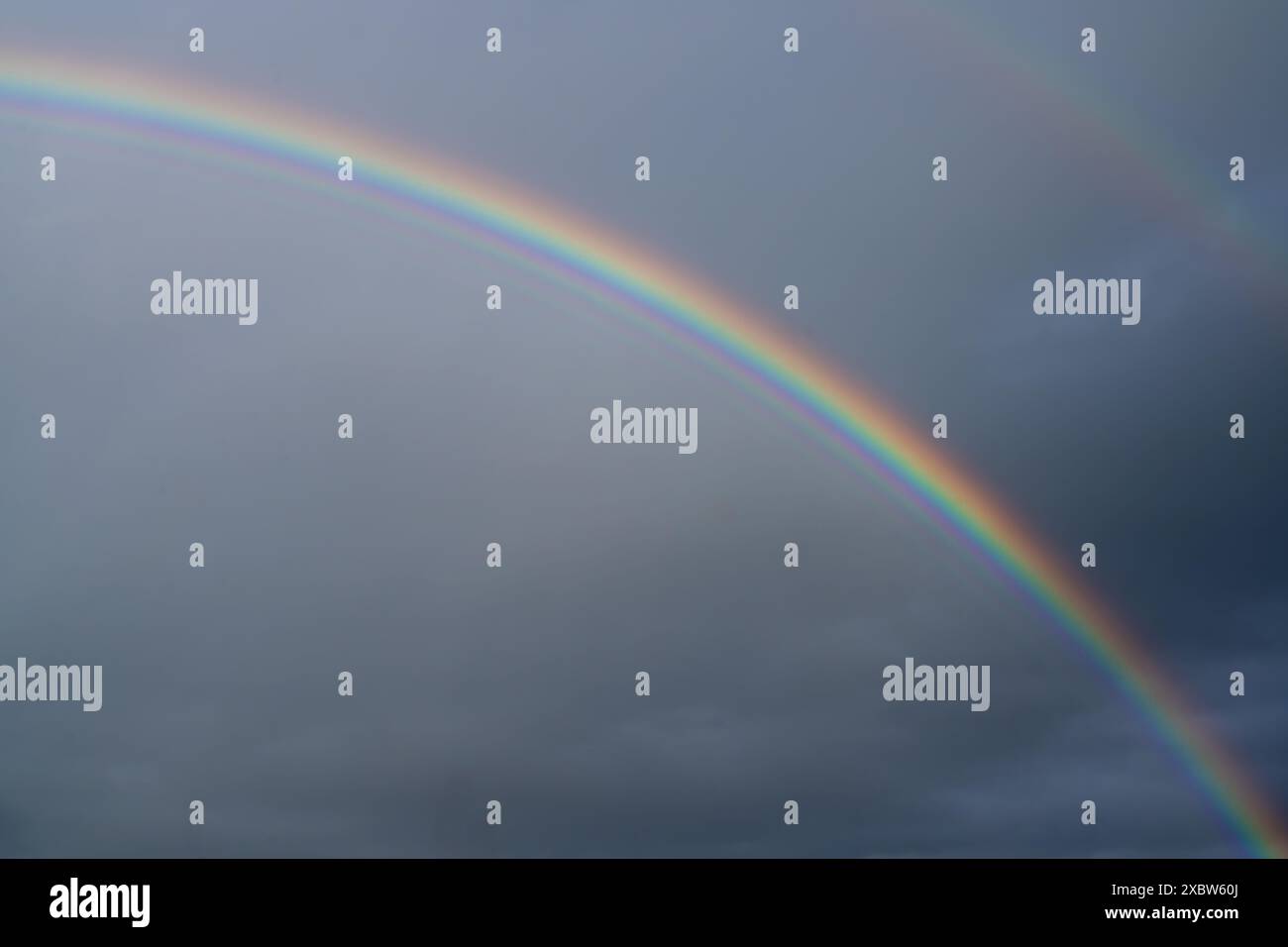 Low angle view to sky with rainbow Stock Photo