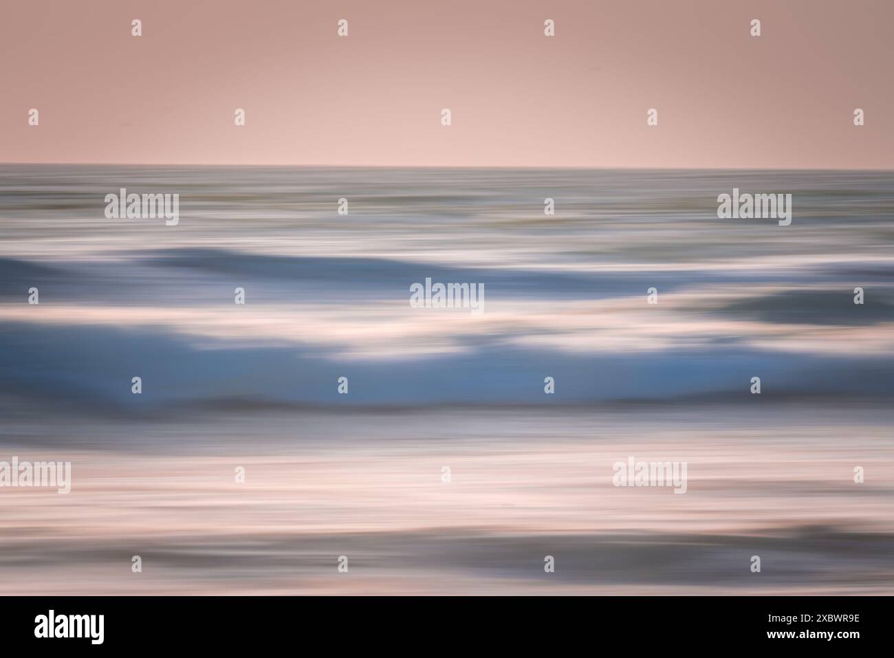 Soft pink sunset over ocean hi-res stock photography and images - Alamy