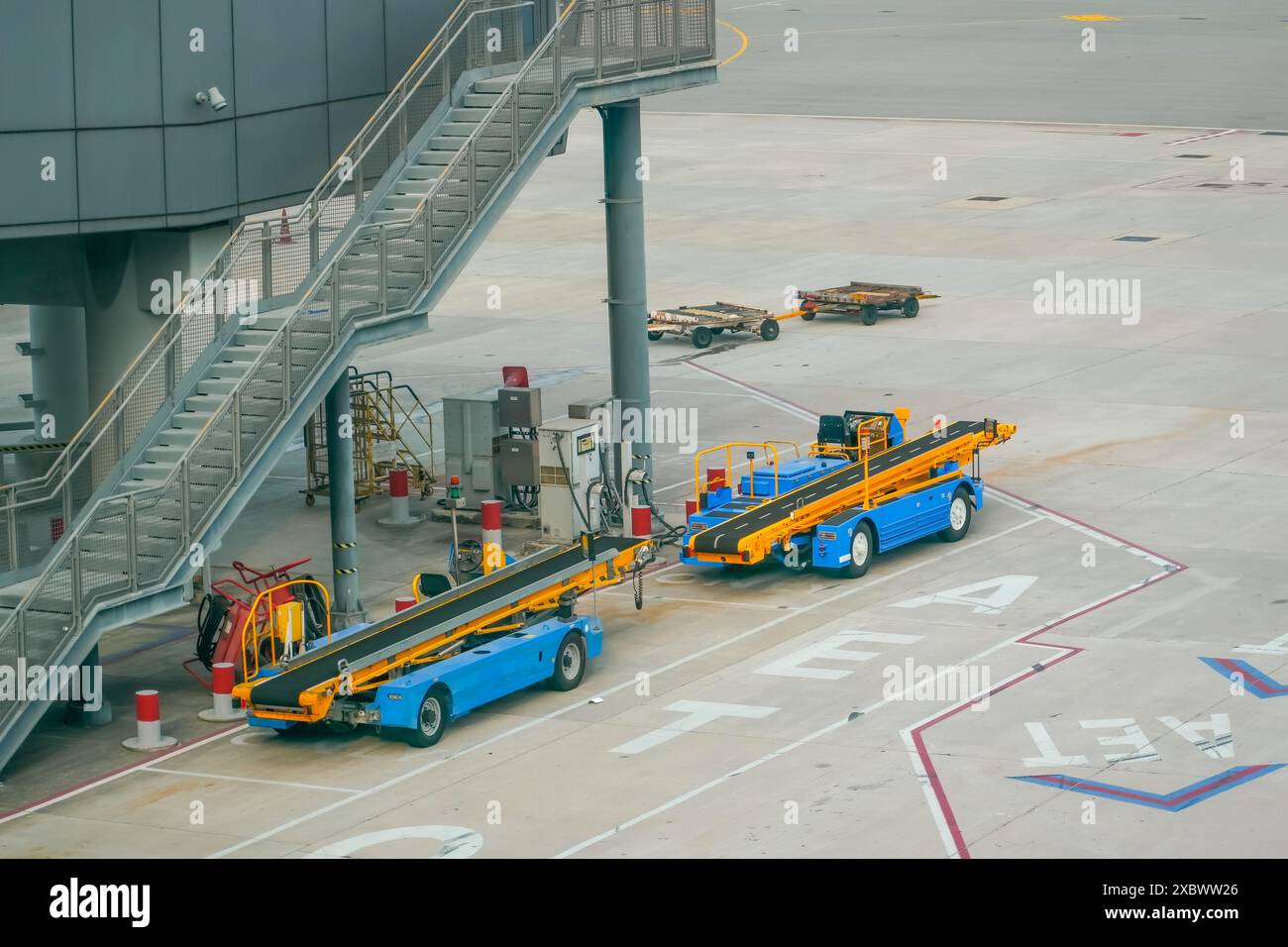 Equipment of a machine for loading and unloading luggage on an airplane ...