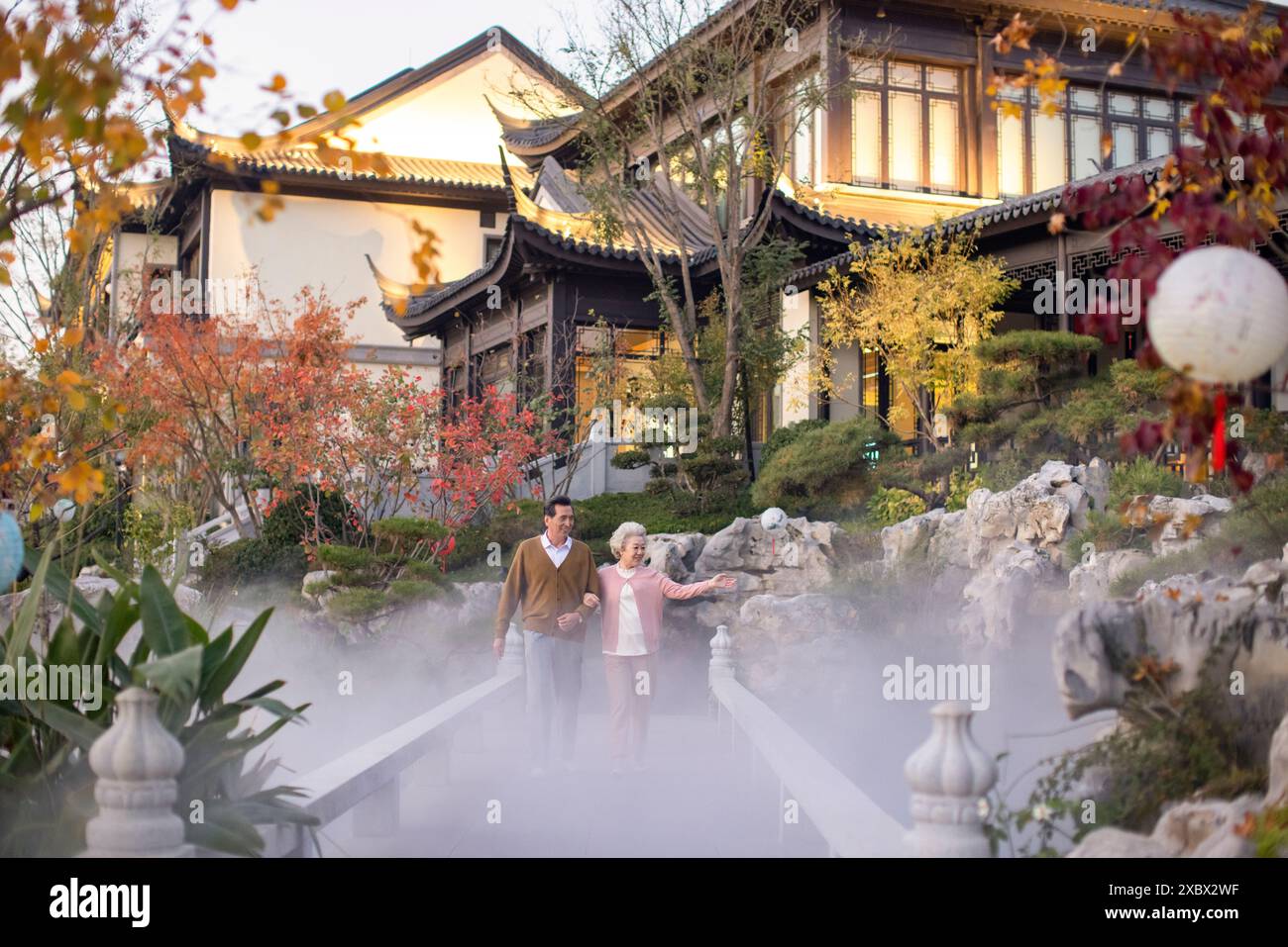 Asian couple walk home hi-res stock photography and images - Alamy