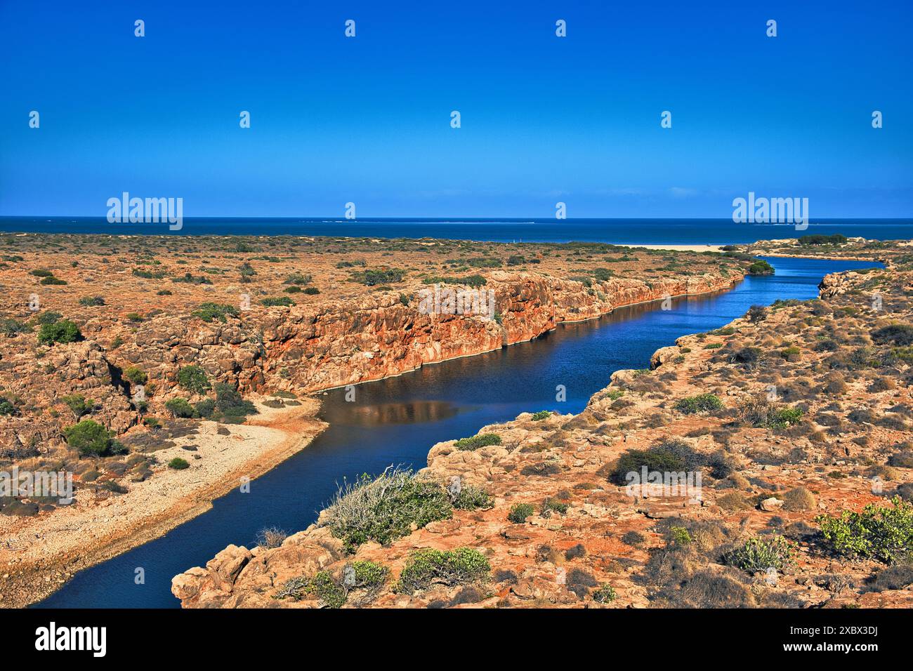 Aerial view of Yardie Creek, the surrounding outback karst landscape and the coast of the Indian Ocean, Cape Range National Park, Western Australia Stock Photo