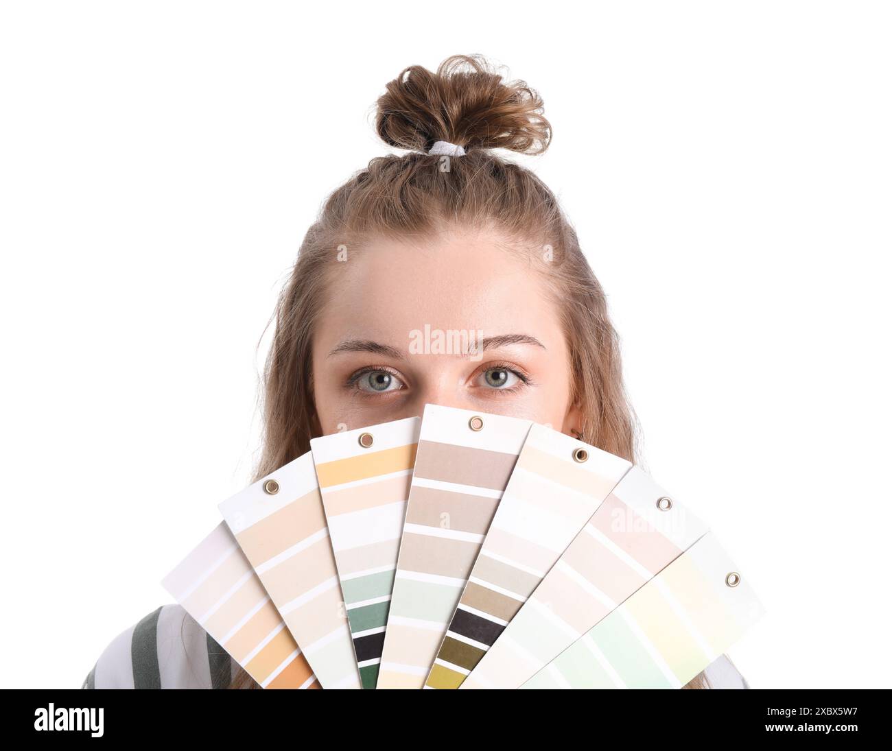 Female artist with paint color palettes on white background, closeup ...