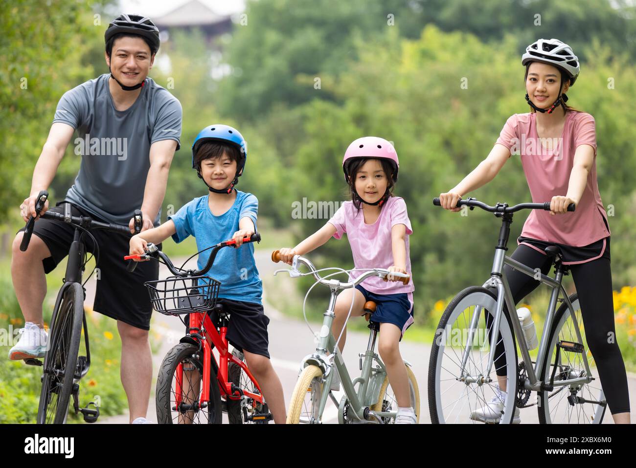 Child riding bicycle side view helmet hi-res stock photography and ...