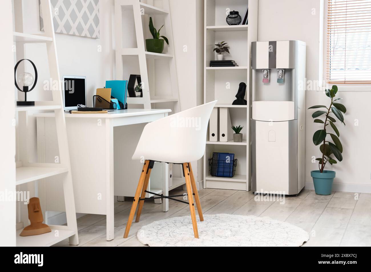Interior of office with modern water cooler Stock Photo - Alamy