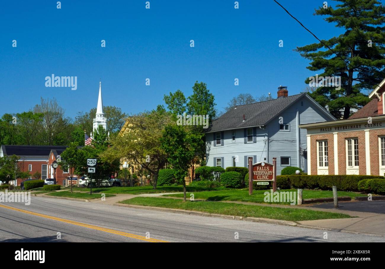 Columbia Street is the main highway through this Cleveland suburb and passes by businesses and a church of an old-tiime character. Stock Photo