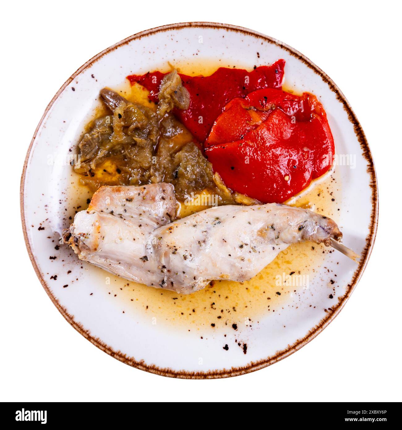 Roasted rabbit served with potato and vegetables Stock Photo