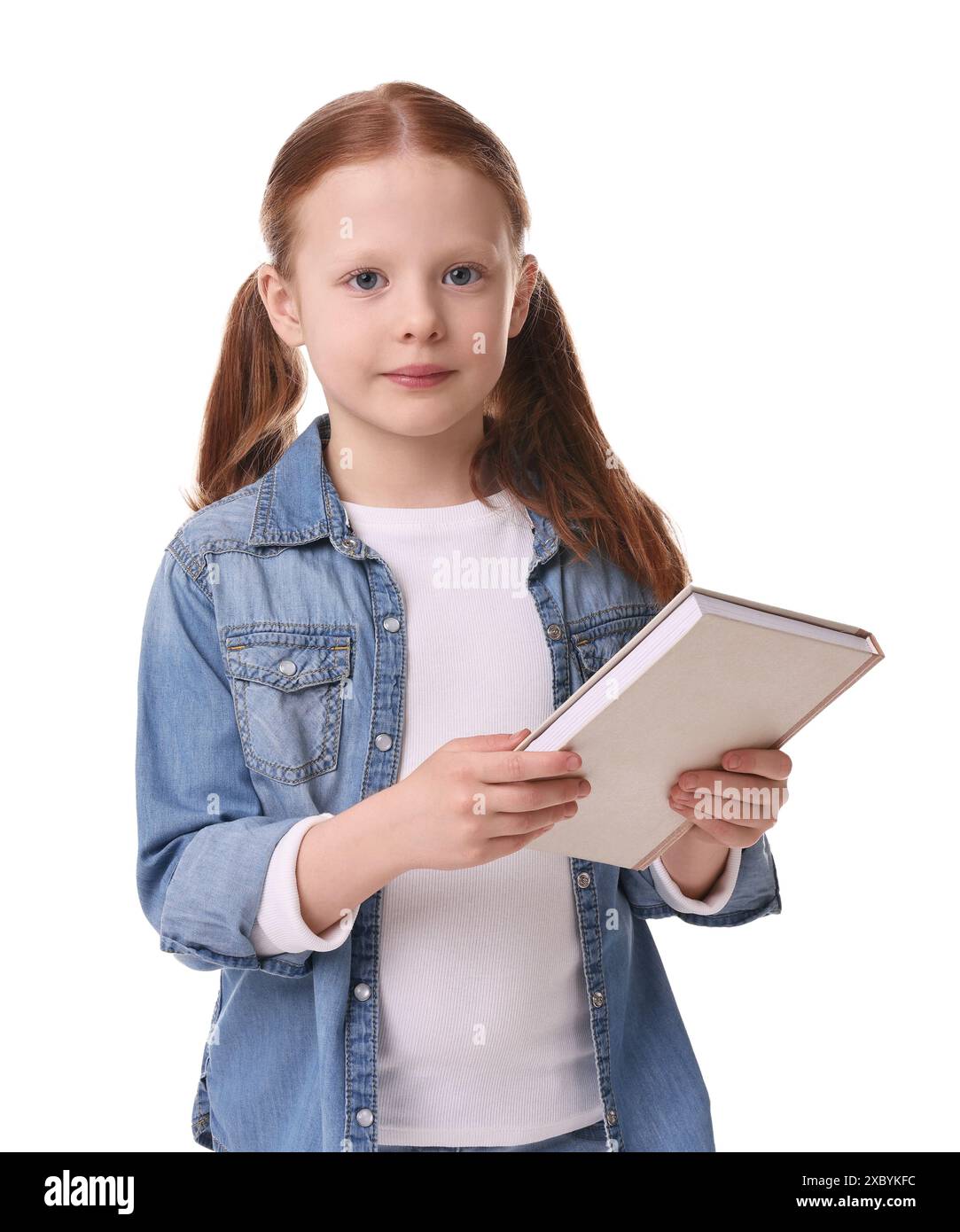 Cute little girl with book on white background Stock Photo - Alamy