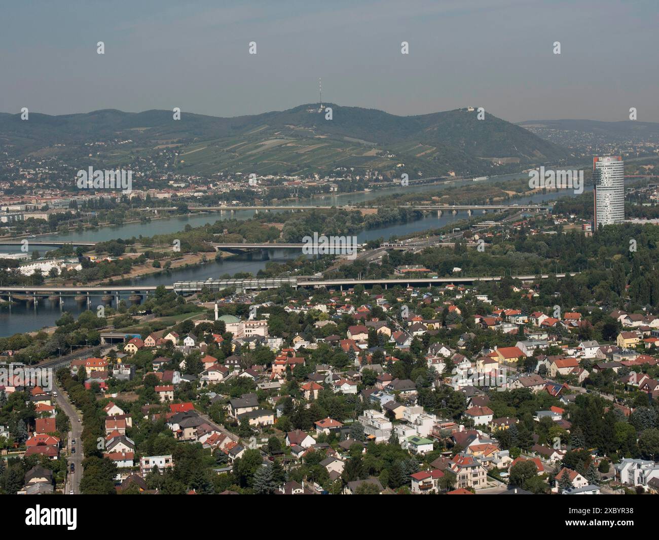 Expansive city panorama with river, bridges and extensive landscape ...