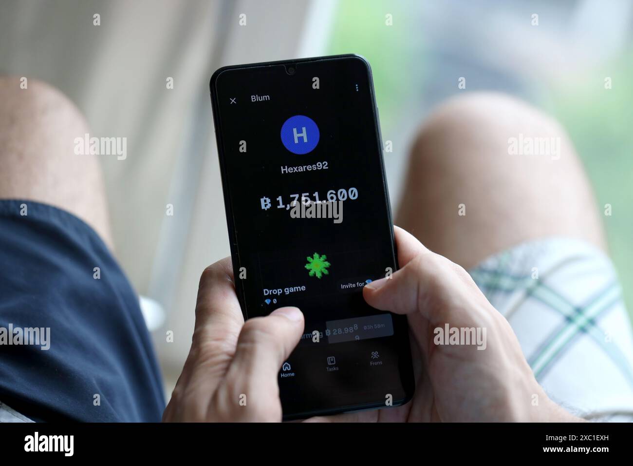 KYIV, UKRAINE - APRIL 20, 2024 Blum telegram bot on smartphone screen. Blum  is a viral Telegram based crypto game for earn tokens by managing a virtual  crypto exchange Stock Photo - Alamy