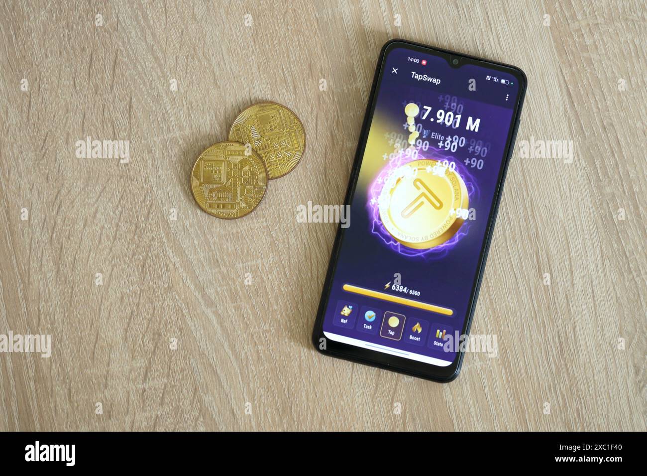 KYIV, UKRAINE - APRIL 20, 2024 Tap Swap telegram bot on smartphone screen.  Tap Swap is a viral Telegram based crypto game for earn tokens by managing  a virtual crypto exchange Stock Photo - Alamy