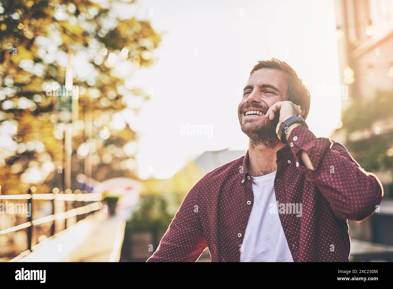 Phone call, entrepreneur and laughing of man, street and communication ...