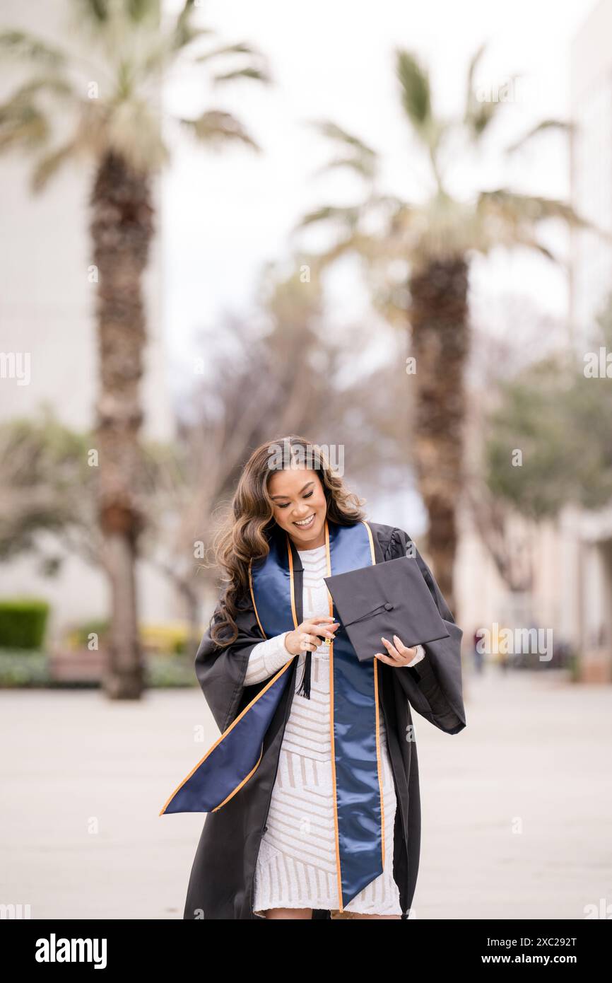 Asian female graduate holding hi-res stock photography and images - Alamy