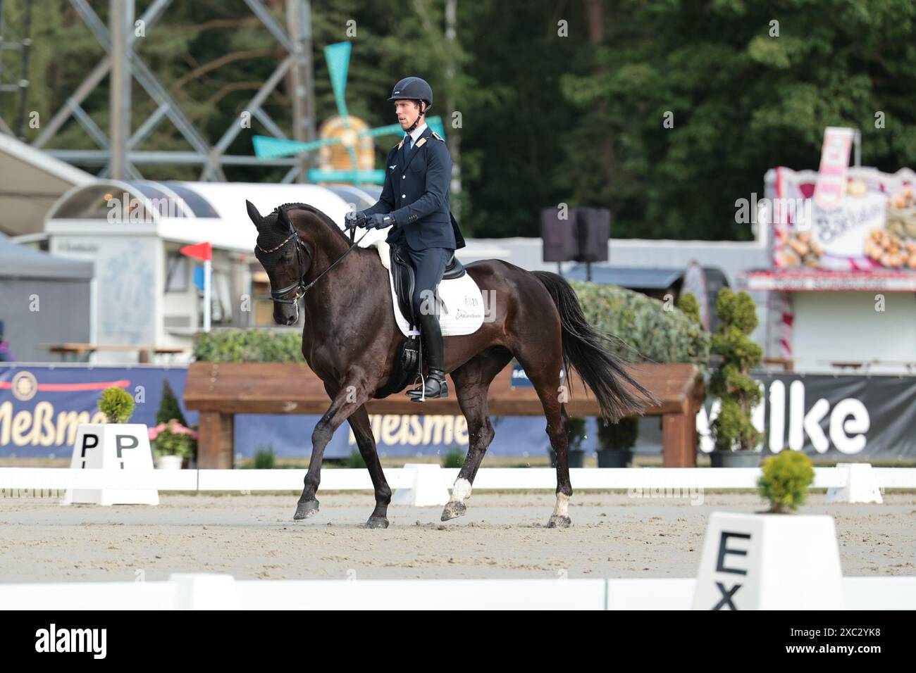 Luhmuhlen, Germany, June 14, 2024 Jerome Robine of Germany with Black