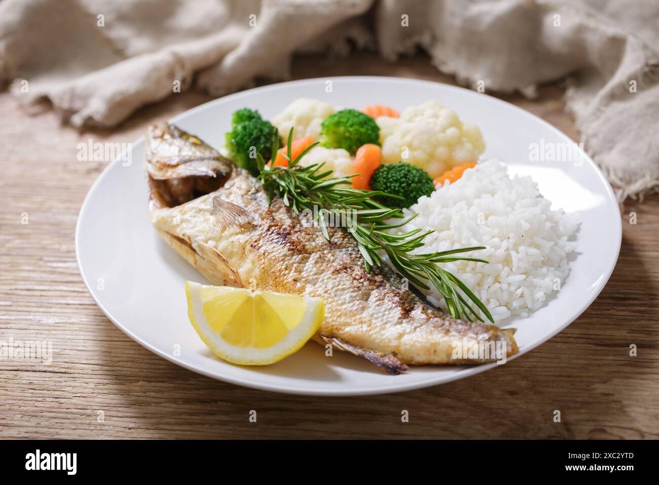 Fish And Rice Plate Fish and rice with vegetables hi-res stock photography and images - Alamy