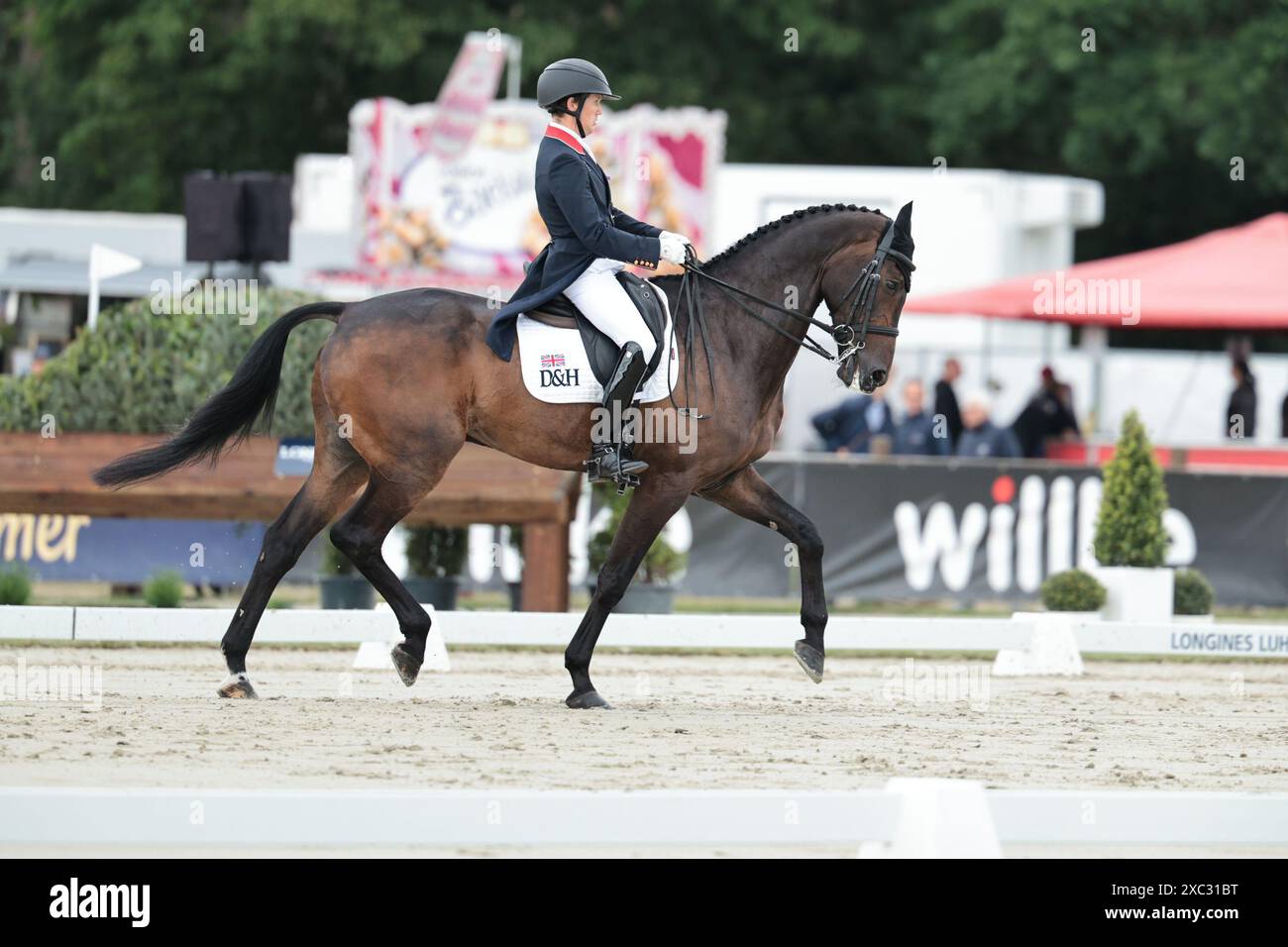 Luhmuhlen, Germany, June 14, 2025 Tom McEwen of Great Britain with Jl