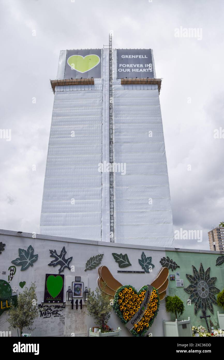 london-uk-14th-june-2024-the-memorial-wall-next-to-grenfell-tower-on