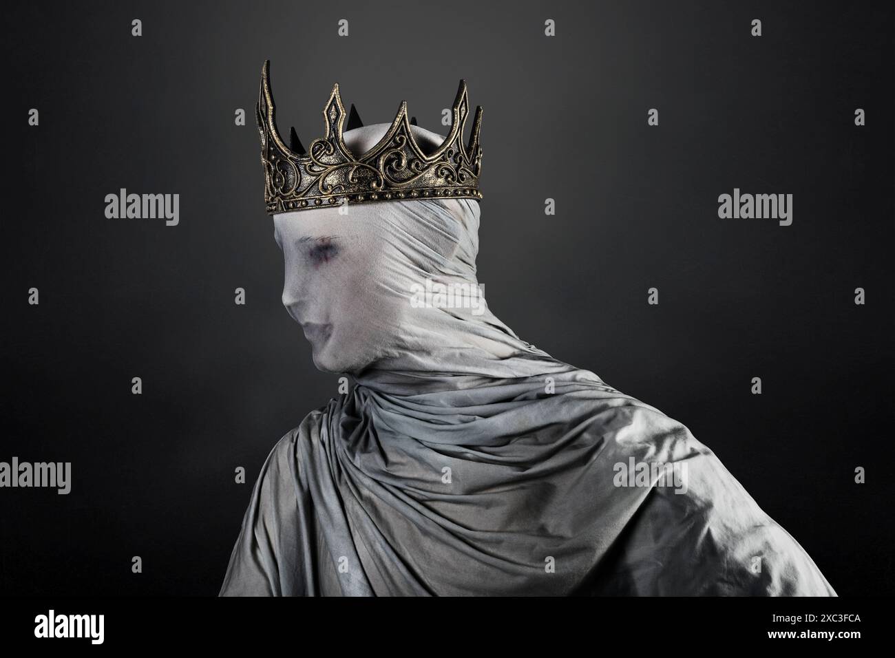 Ghost of a queen or king over dark misty background Stock Photo