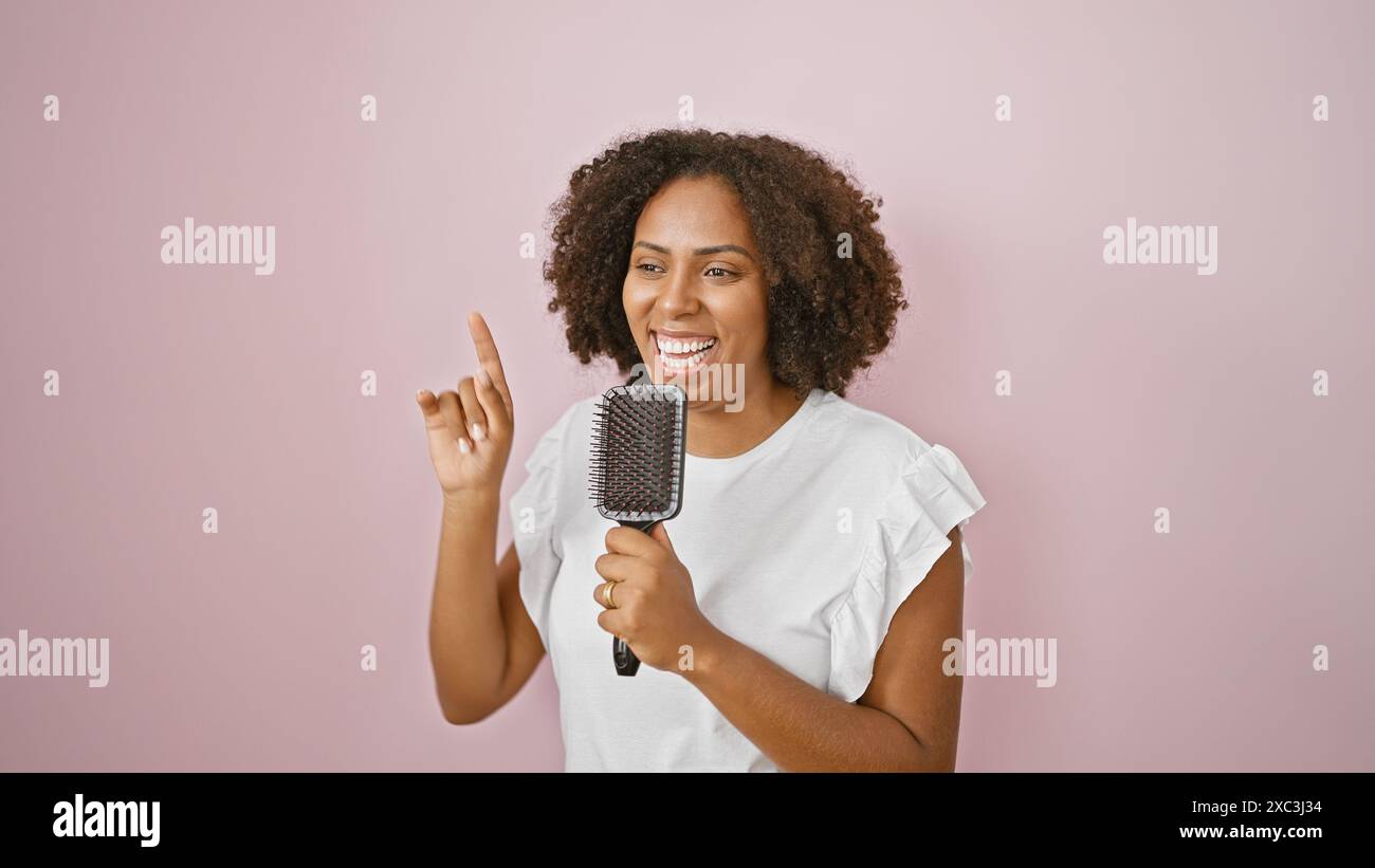 Person singing with a hairbrush hi-res stock photography and images - Alamy