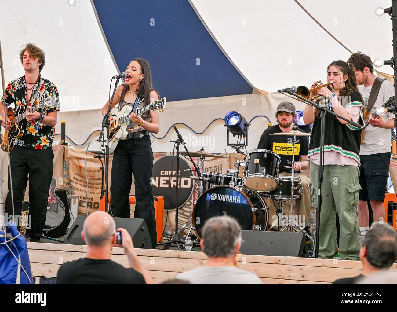 Ruby J Eridge, UK. 14th June, 2024. Ruby J and her band play in the Cafe Nero ...