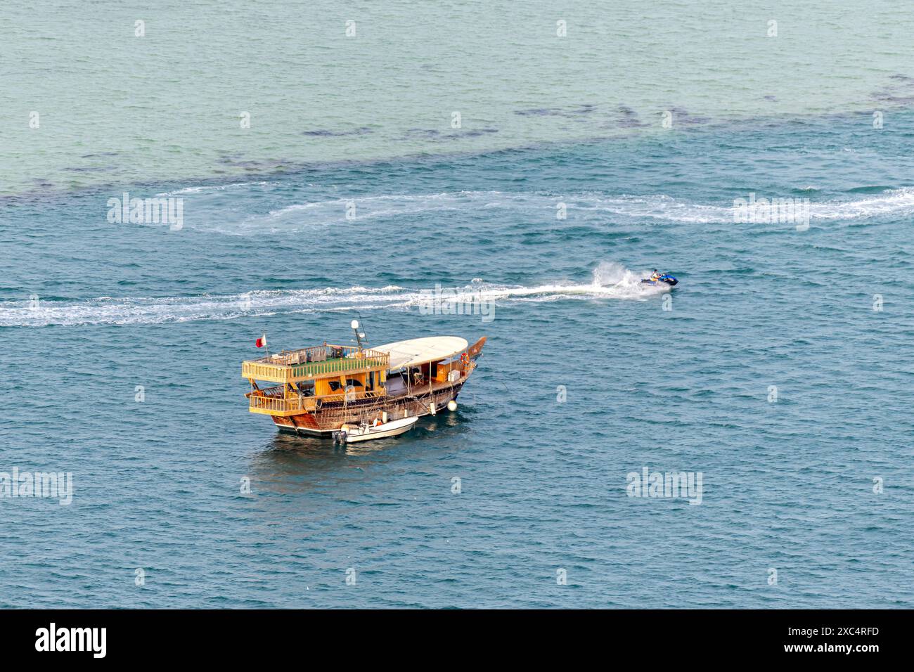 High-angle view of an old wooden dhow boat at corniche Doha Stock Photo