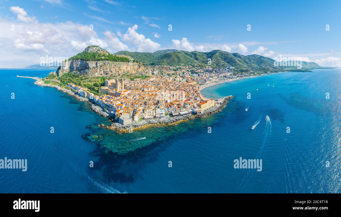 Aerial view showcasing its historic architecture, stunning coastline, and Mediterranean charm of Cefalu, Sicily. Stock Photo