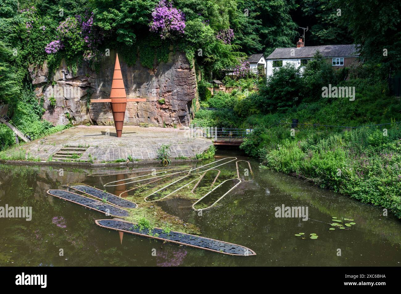 Artworks by Bronzcast. depicting a former crane and the coal boats known as 'starvationers', at Worsley Delph, Salford,, England, UK Stock Photo
