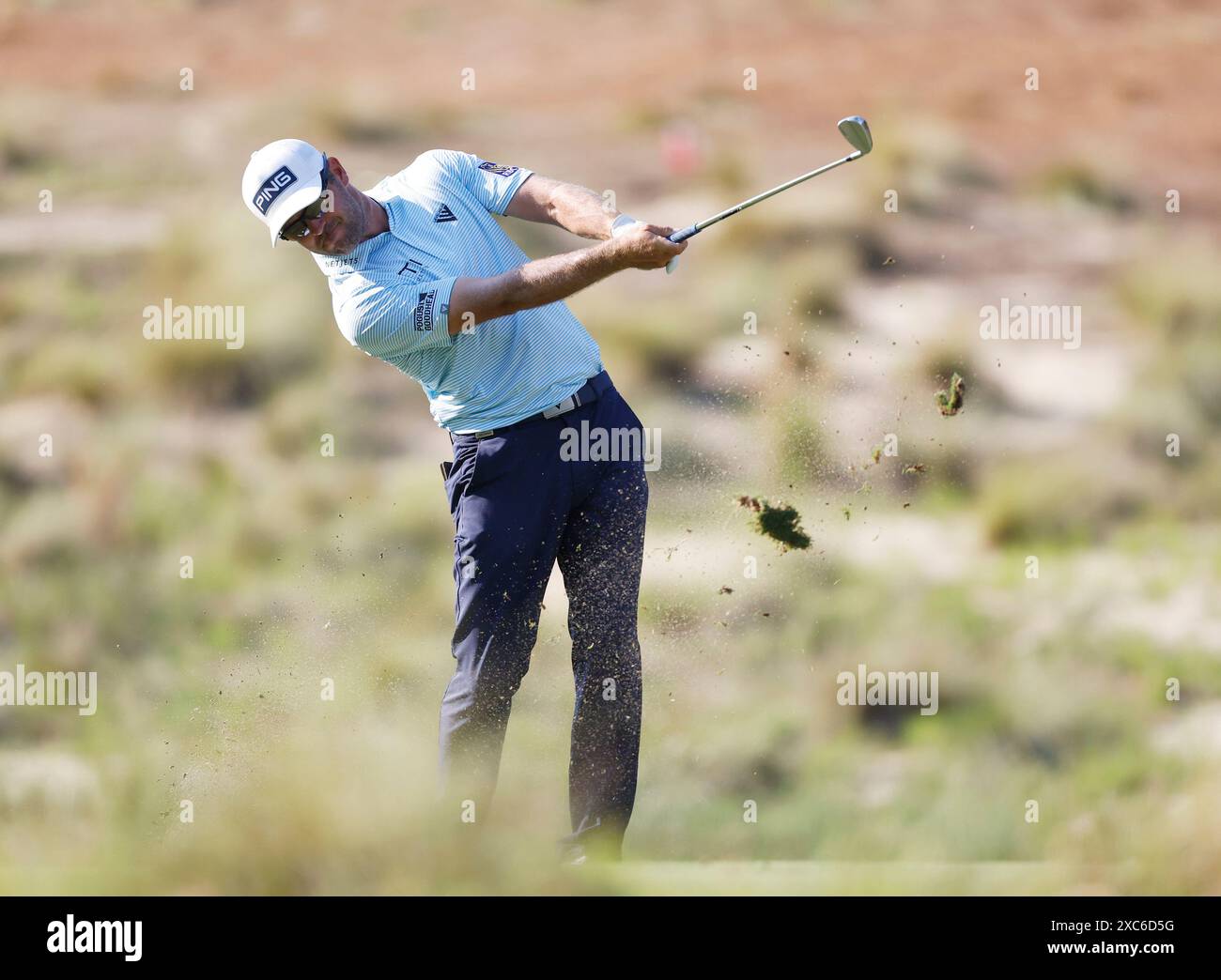 Pinehurst, United States. 14th June, 2024. Corey Conners of Canada hits an approach shot from the fairway to the eighth green during the second round of the 124th U.S. Open golf championship at Pinehurst Resort & Country Club in Pinehurst, N.C. on Friday, June 14, 2024. Photo by John Angelillo/UPI Credit: UPI/Alamy Live News Stock Photo