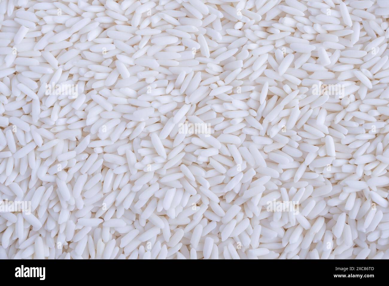 Thailand white glutinous sticky rice texture background Stock Photo - Alamy