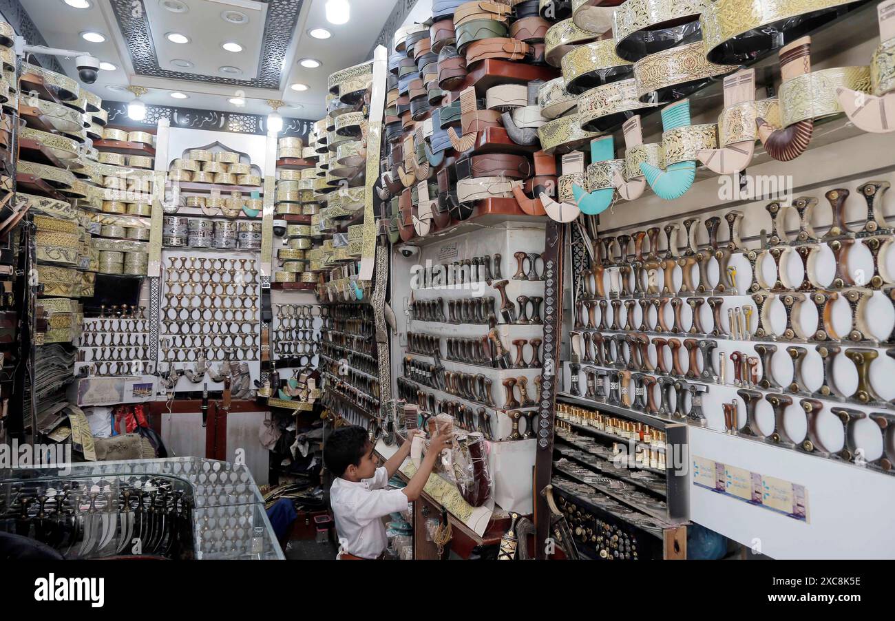 Sanaa, Yemen. 11th June, 2024. Traditional daggers are on sale at a