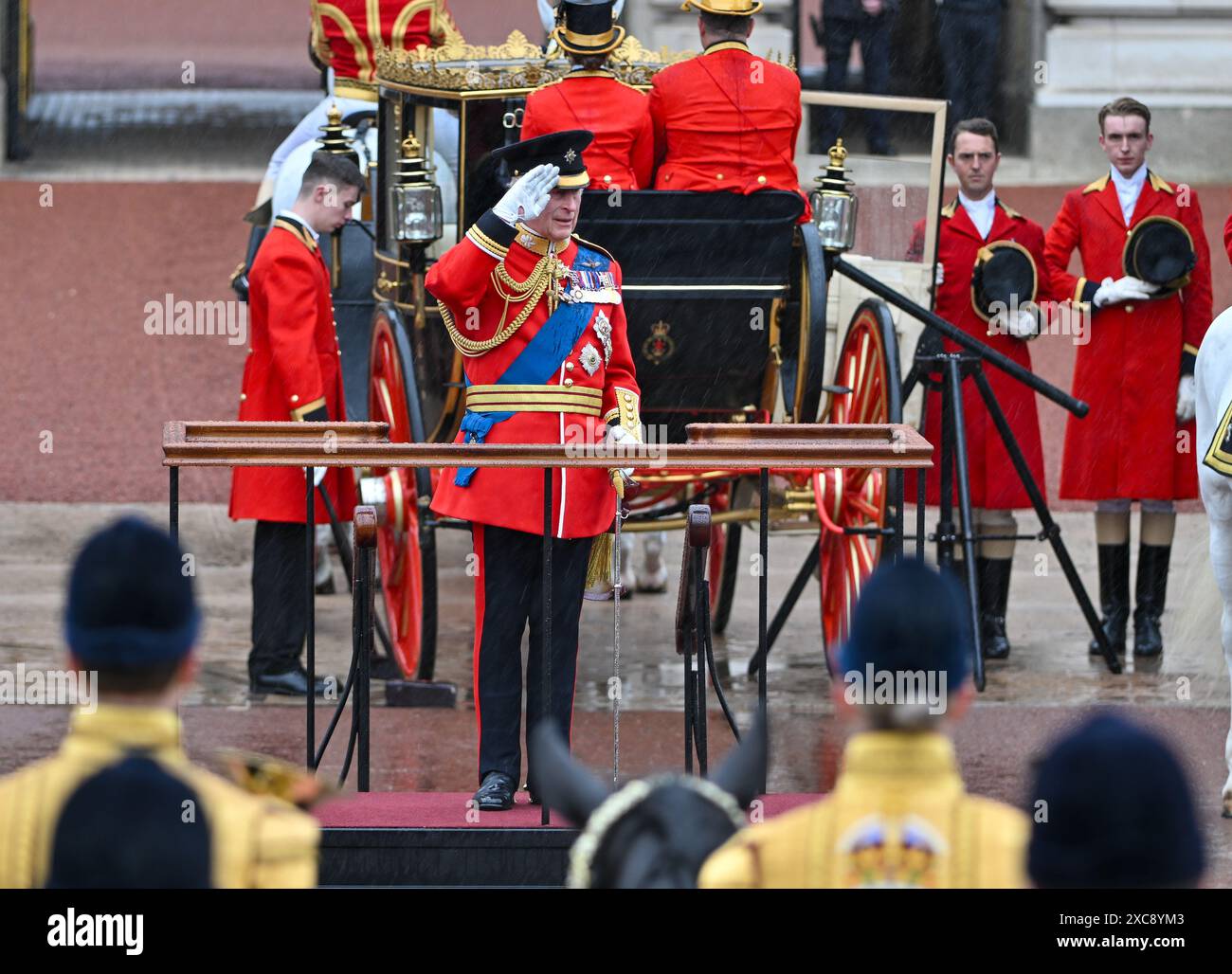 London, UK. 15th June, 2024. King Charles III takes the salute outside