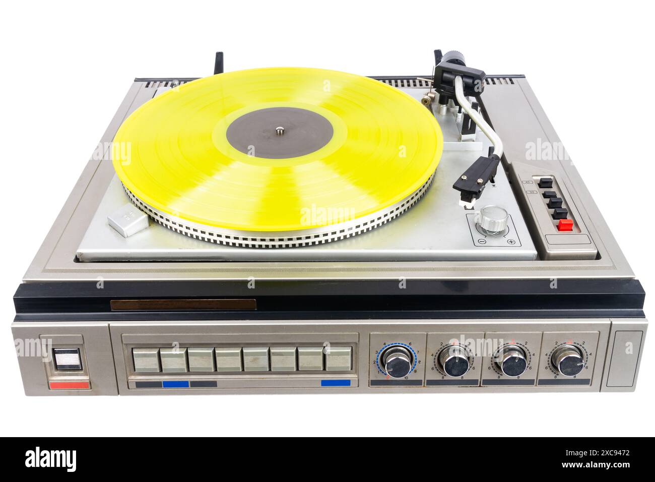 Vintage turntable record player with yellow vinyl isolated on white ...