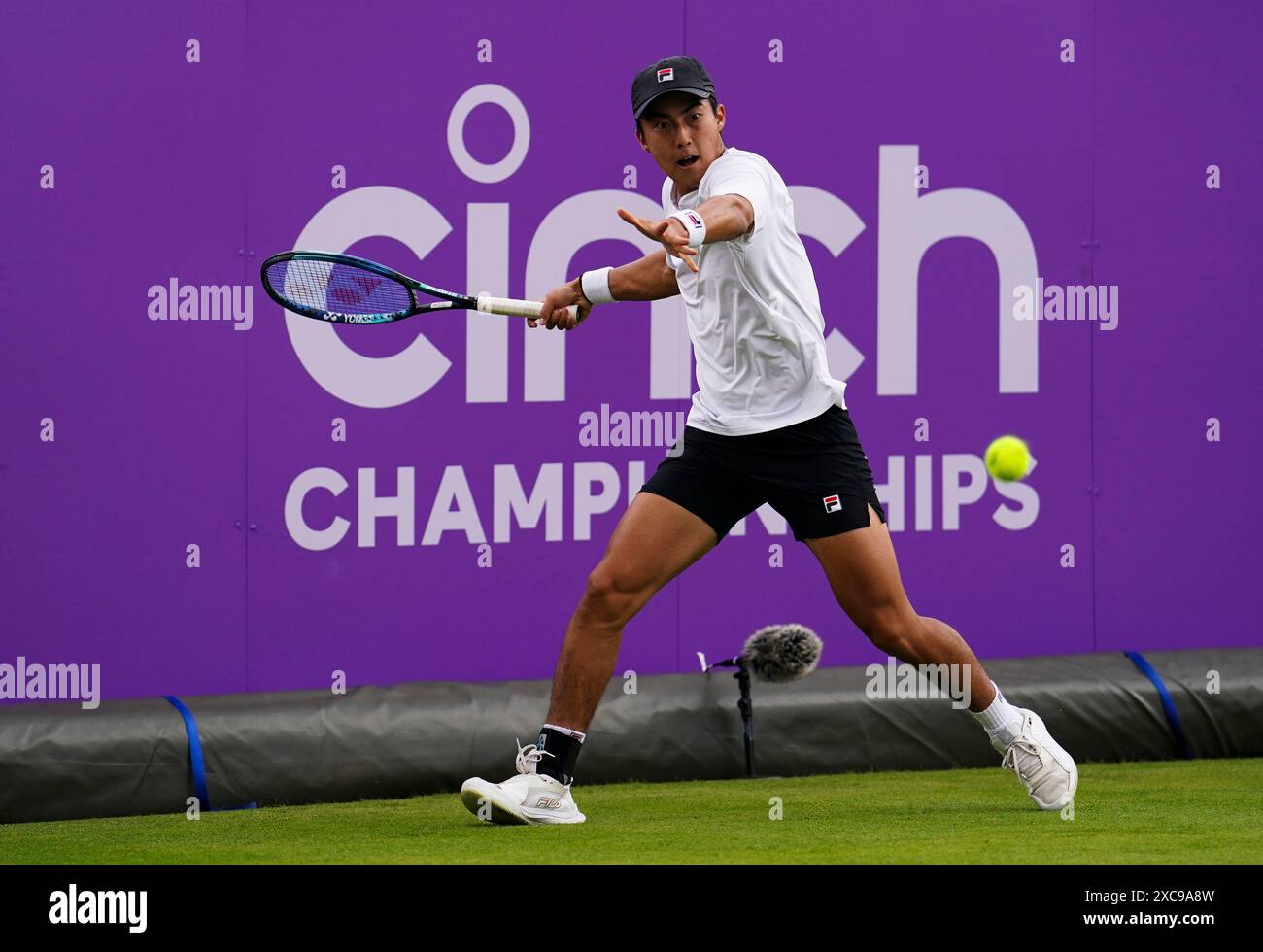 Queens Rinky Rinky Hijikata in action against Henry Searle (not pictured) on day one ...