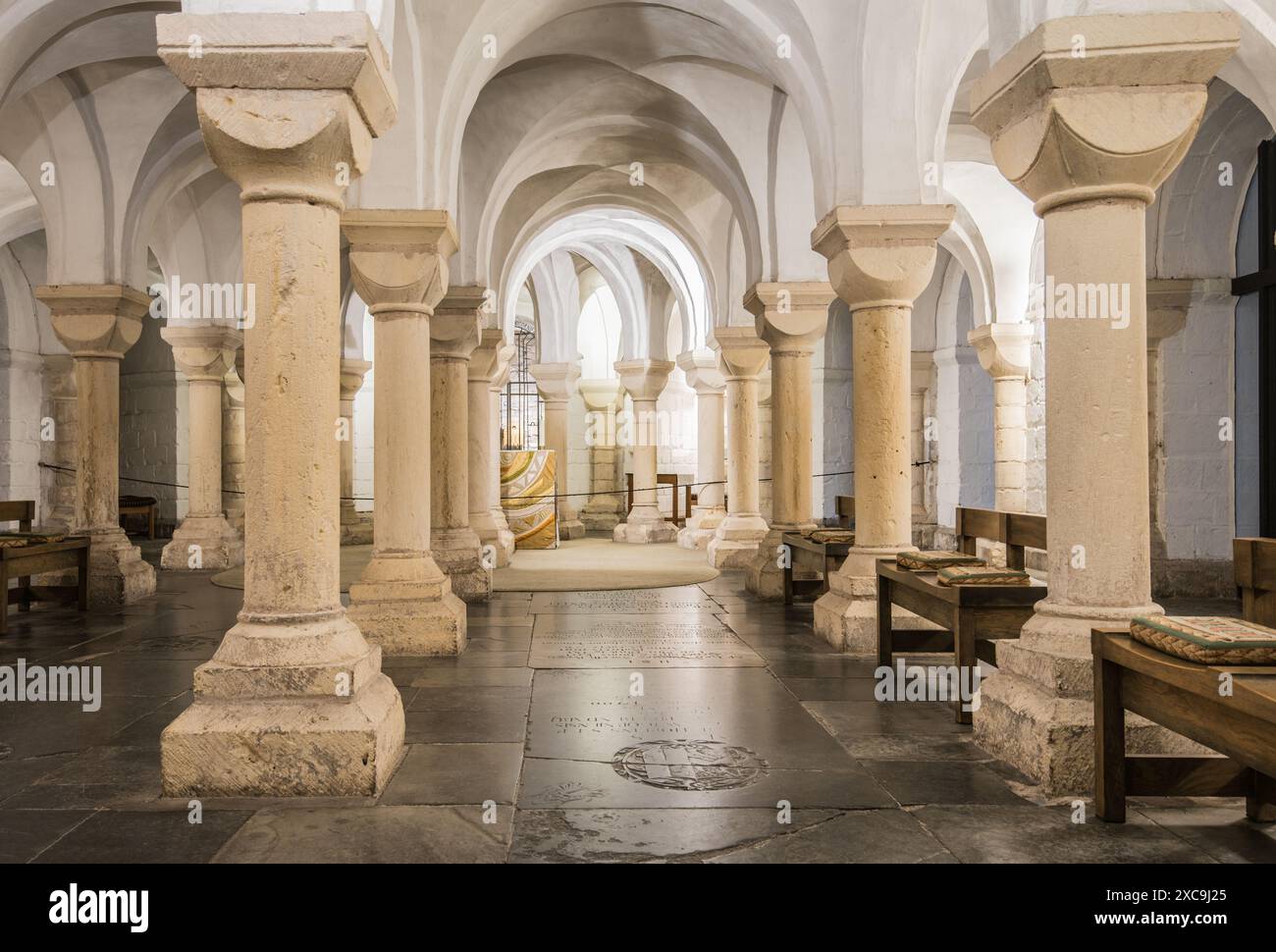 The crypt at Worcester cathedral was built in 1084.It has clusters of creamy stone piers and white lime-washed walls & is multi-aisled. Stock Photo