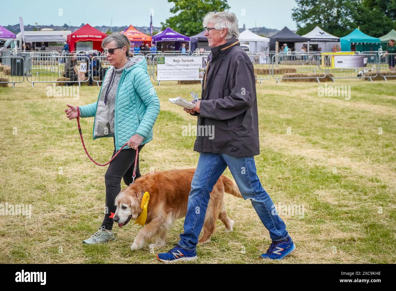 Powderham, UK. 15th June, 2024. Dog lovers descend on Powderham Castle