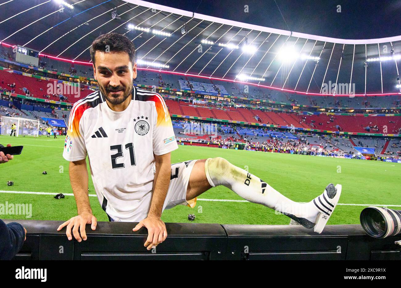 Ilkay Guendogan, DFB 21 with ankle injury goes to his wife Sara after the group stage match GERMANY - SCOTLAND 5-1 of the UEFA European Championships 2024 on Jun 14, 2024 in Munich, Germany. Photographer: ddp images/star-images Credit: ddp media GmbH/Alamy Live News Stock Photo
