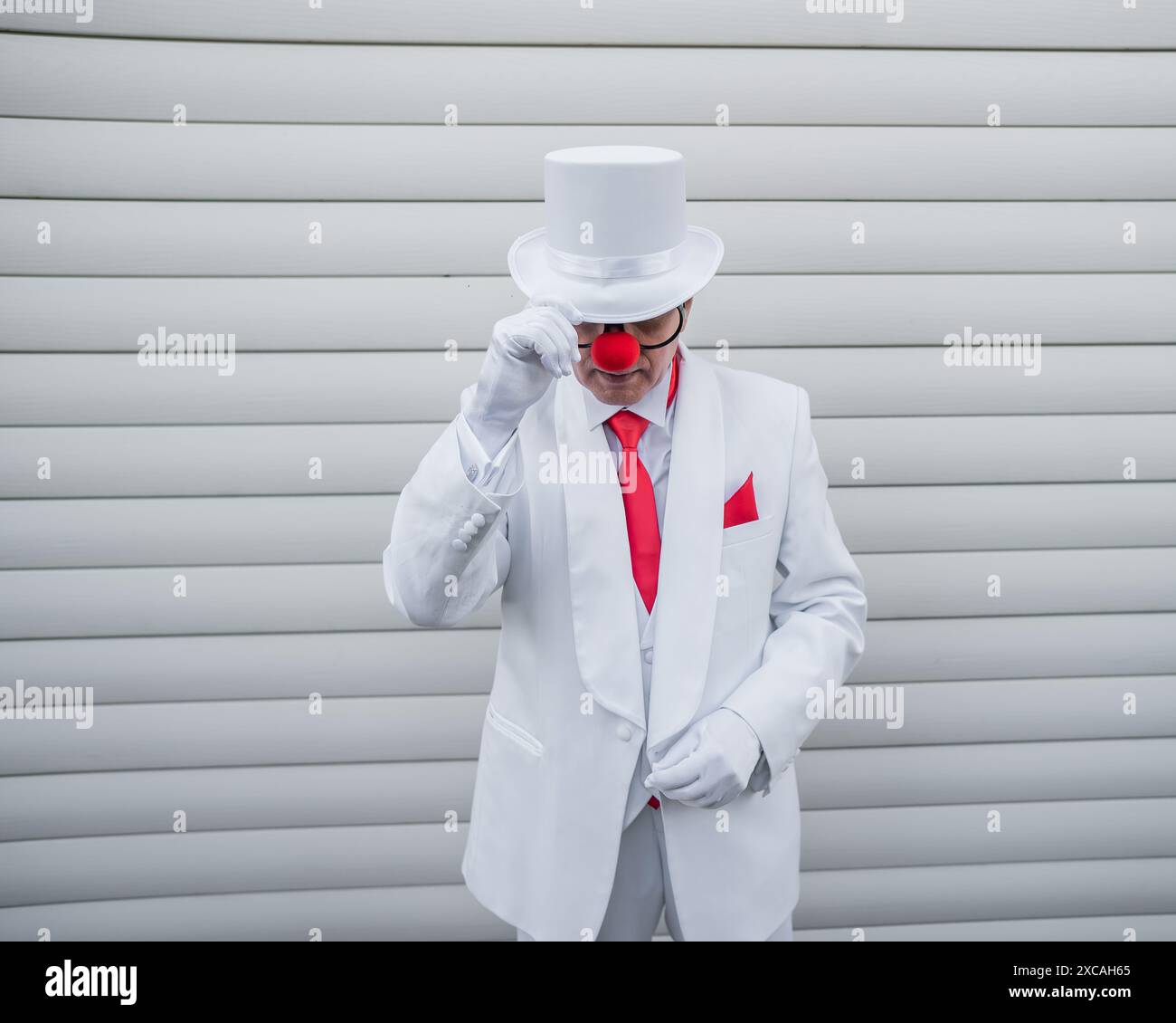 Portrait strange clown in suit hi-res stock photography and images - Alamy