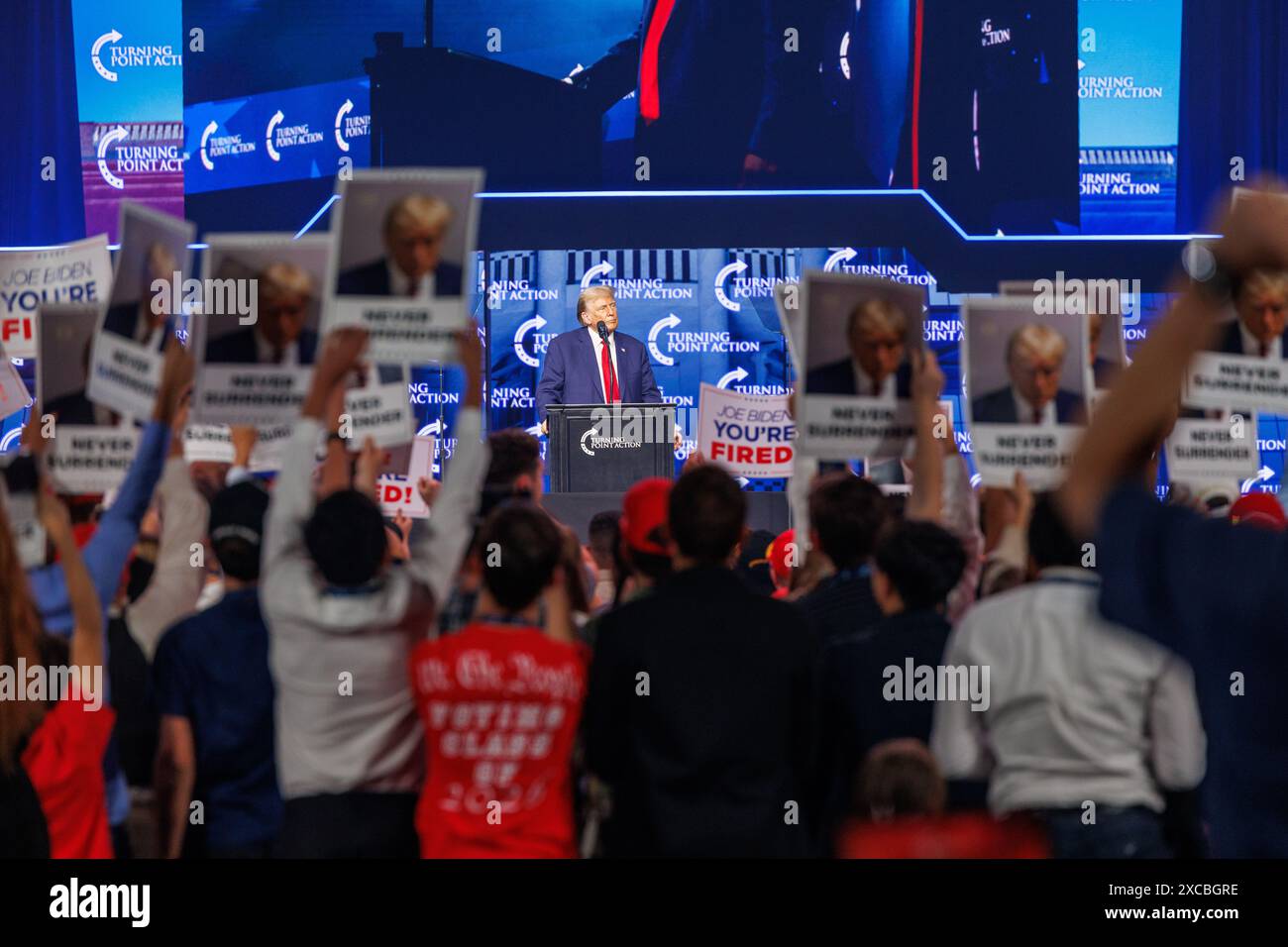 Former President Donald Trump speaks at a Turning Point Action convention in Detroit, Mich., on